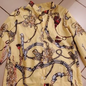 ** 6 for $20 New Yellow Blouse w/ a cute design..